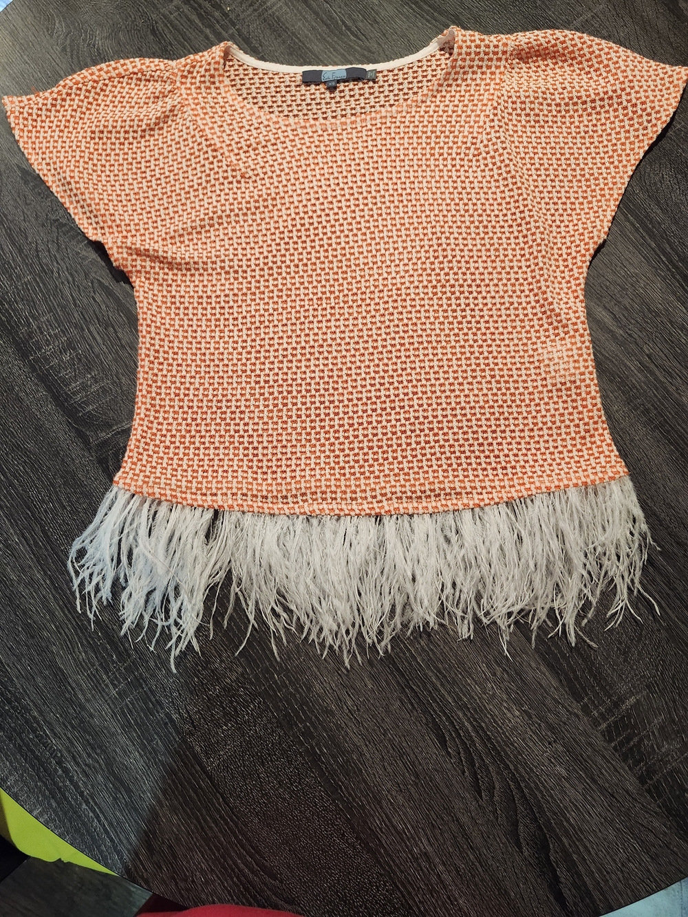 Anthropologie Orange Knit Top with Feather Hem